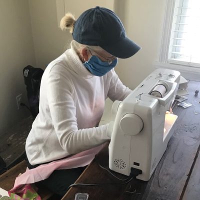 Cindy Chitty and Peggy Morey making protective head coverings for hospital staff in San Diego.